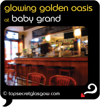 Top Secret Glasgow Quote Bubble showing interior of bar.
Caption: golden glowing oasis